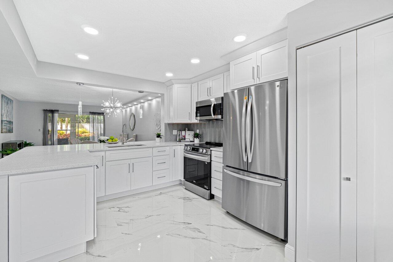 7301 Amberly Lane, Unit 107 Delray Beach, FL 33446 - Photo 11 of 51 006-7301AmberlyLane-DelrayBeach-FL-33446