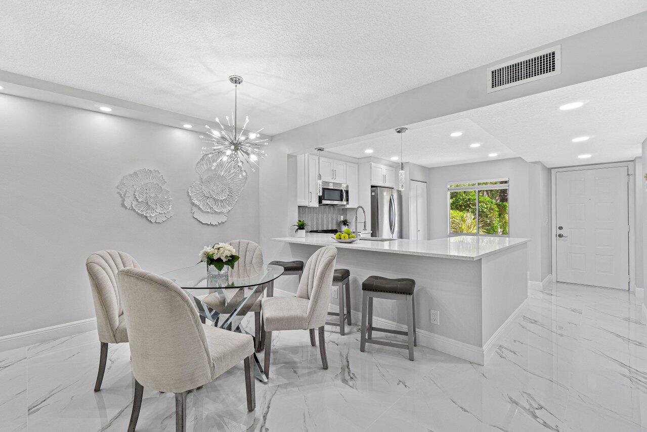 7301 Amberly Lane, Unit 107 Delray Beach, FL 33446 - Photo 9 of 51 012-7301AmberlyLane-DelrayBeach-FL-33446