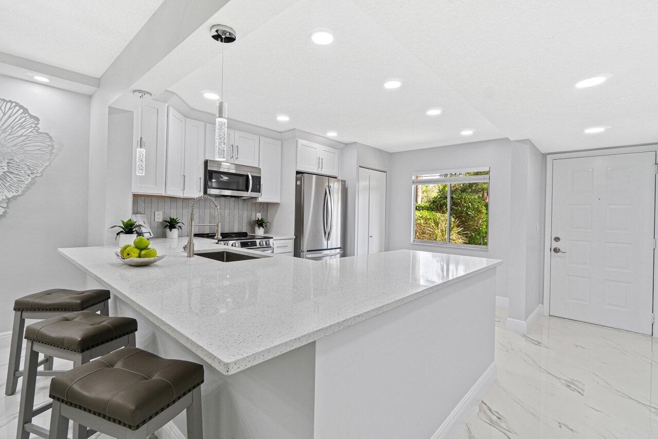 7301 Amberly Lane, Unit 107 Delray Beach, FL 33446 - Photo 10 of 51 010-7301AmberlyLane-DelrayBeach-FL-33446