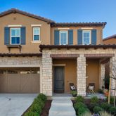 a front view of a house with yard