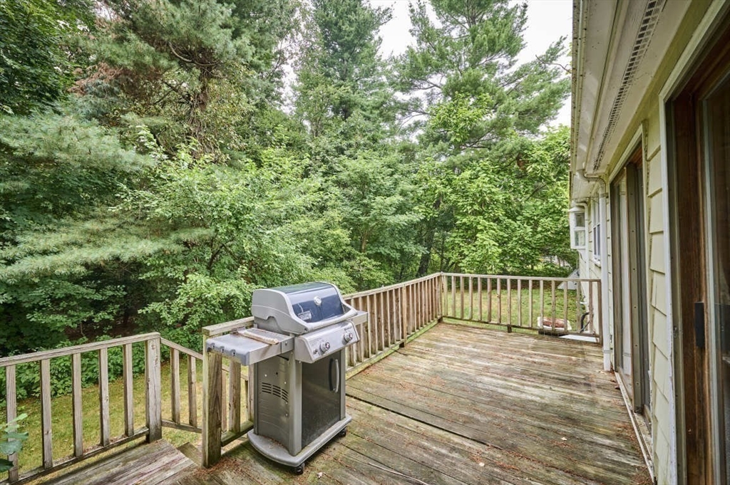 9 Bowman Road Billerica, MA 01821 - Photo 21 of 23 a view of a chair and table in the balcony