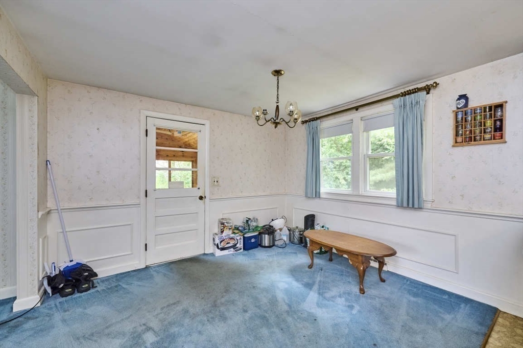9 Bowman Road Billerica, MA 01821 - Photo 6 of 23 a living room with furniture and a window