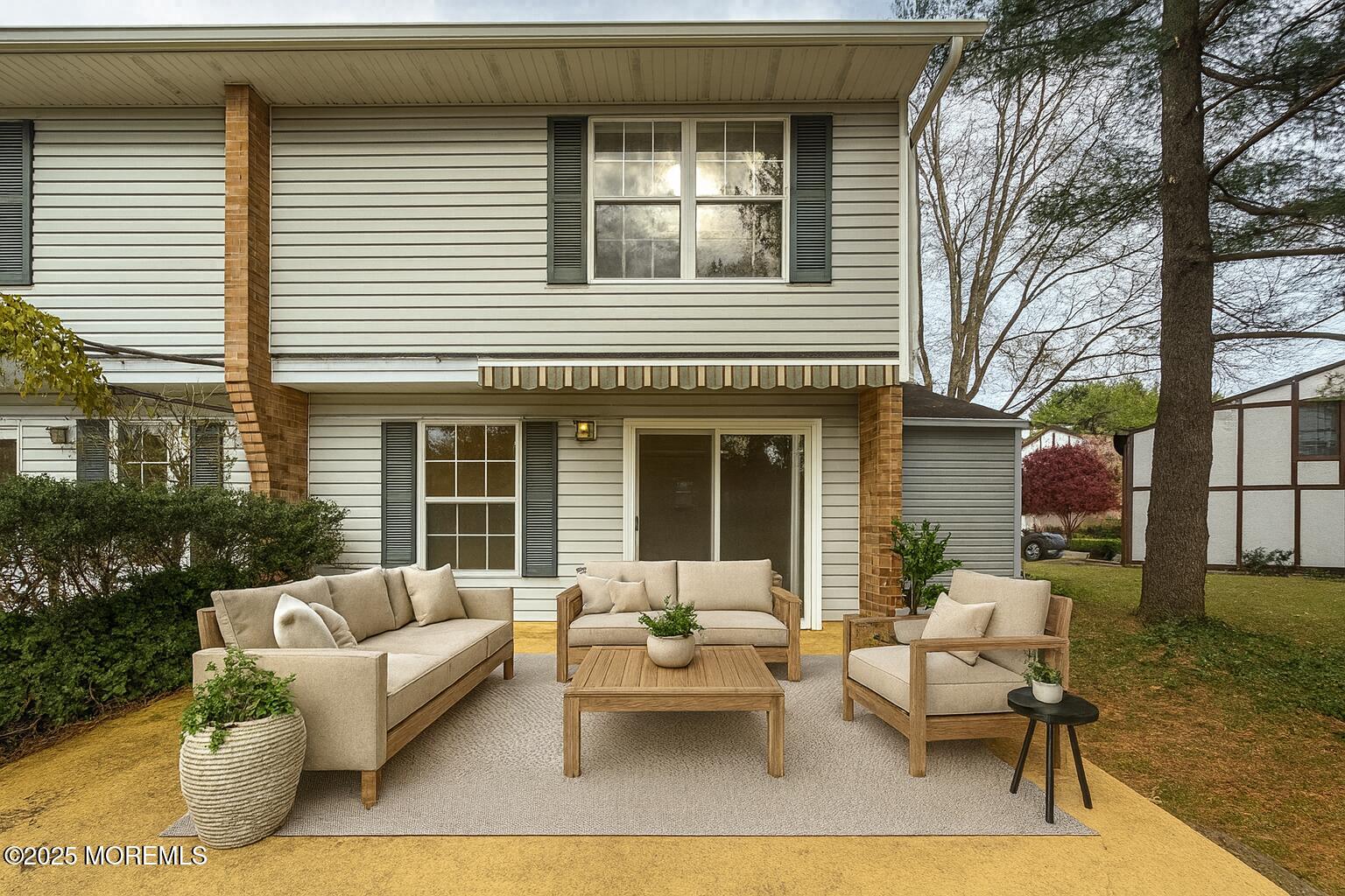 17 Apple Drive Spring Lake, NJ 07762 - Photo 14 of 15 a building outdoor space with patio furniture