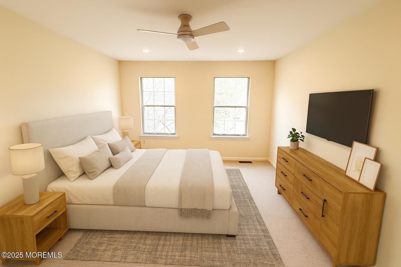 17 Apple Drive Spring Lake, NJ 07762 - Photo 9 of 15 a bedroom with a bed and flat screen tv