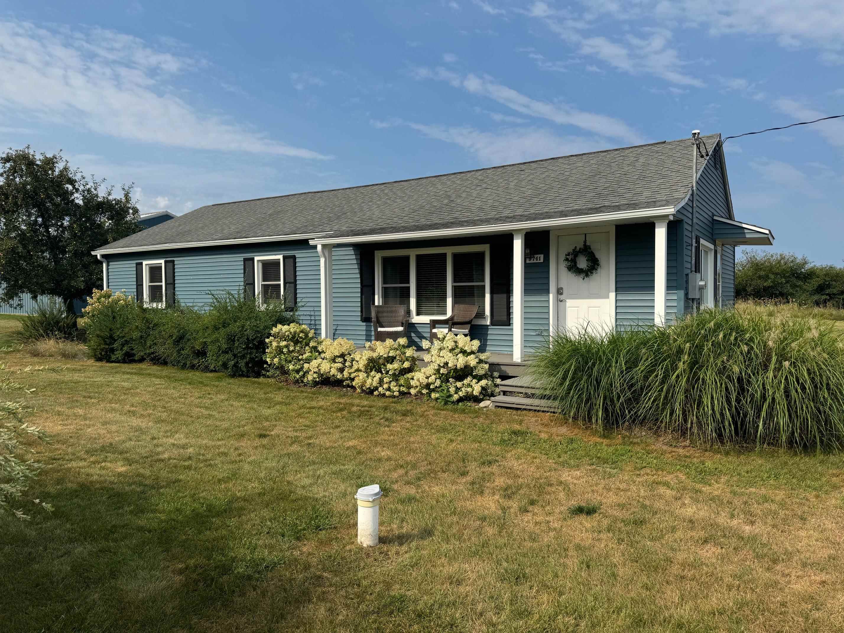 9741 Bates Road Williamsburg, MI 49690 - Photo 1 of 36