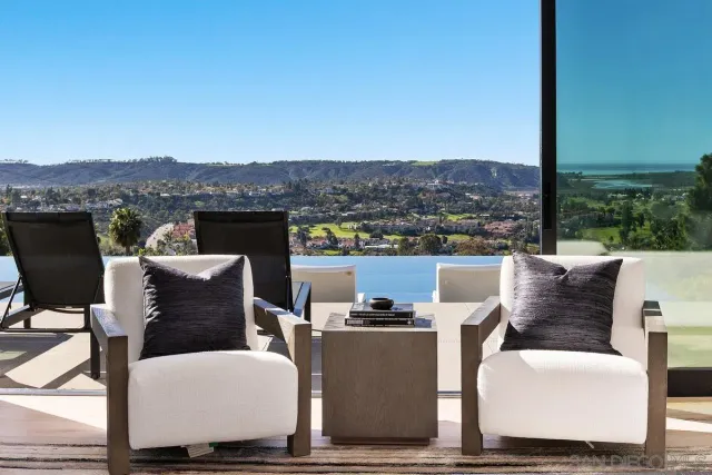 a view of a terrace with furniture