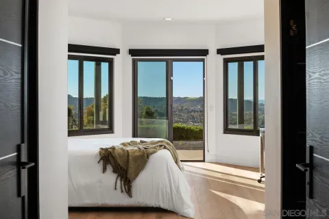 a view of a living room and window