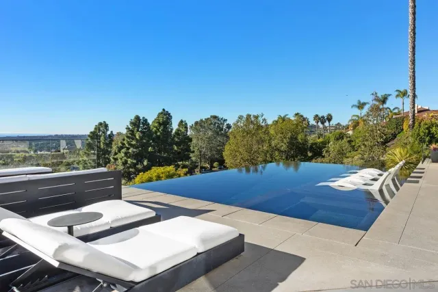 a view of a chairs and table on the terrace