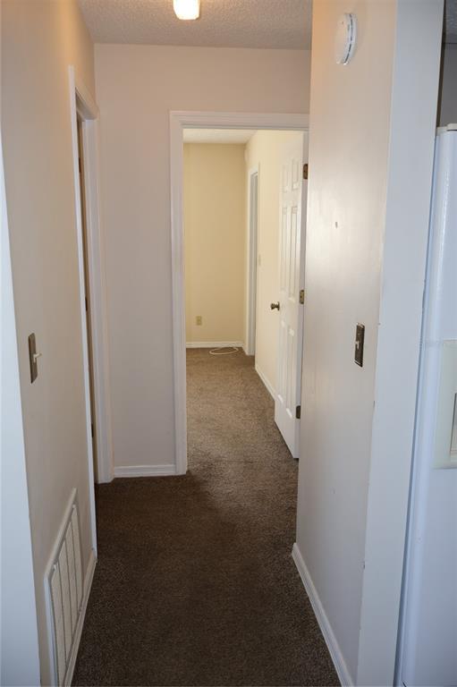 6522 Southwest 60th Court Ocala, FL 34474 - Photo 19 of 23 an empty room with windows