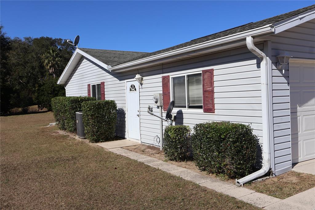 6522 Southwest 60th Court Ocala, FL 34474 - Photo 8 of 23 a view of a house with a yard