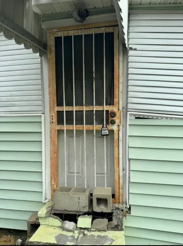 a view of a house with a large window