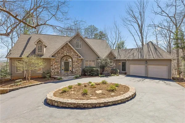 a view of a house with a snow in the yard