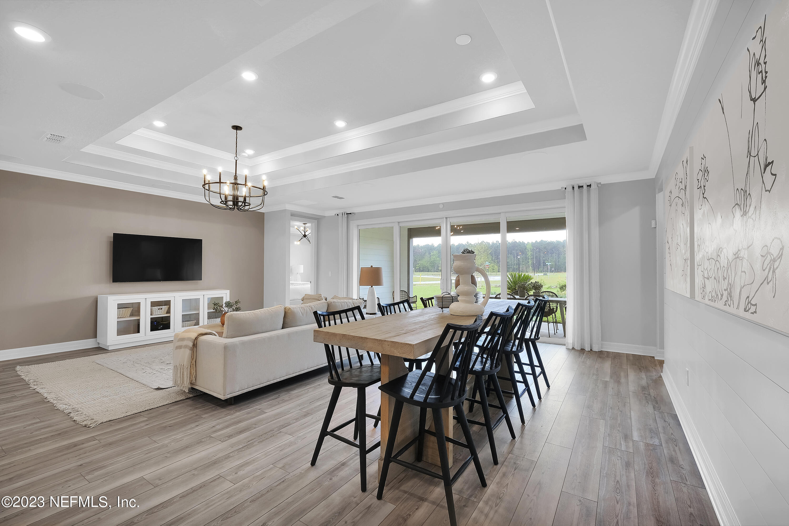 12435 Clapboard Blf Trail Jacksonville, FL 32226 - Photo 11 of 30 a view of a dining room with furniture window and wooden floor