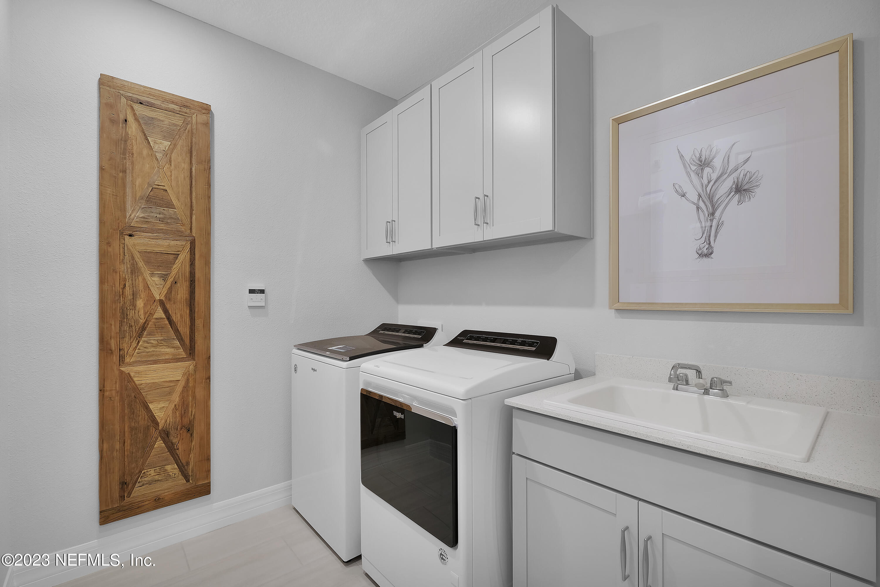 12435 Clapboard Blf Trail Jacksonville, FL 32226 - Photo 17 of 30 a room with storage and utility