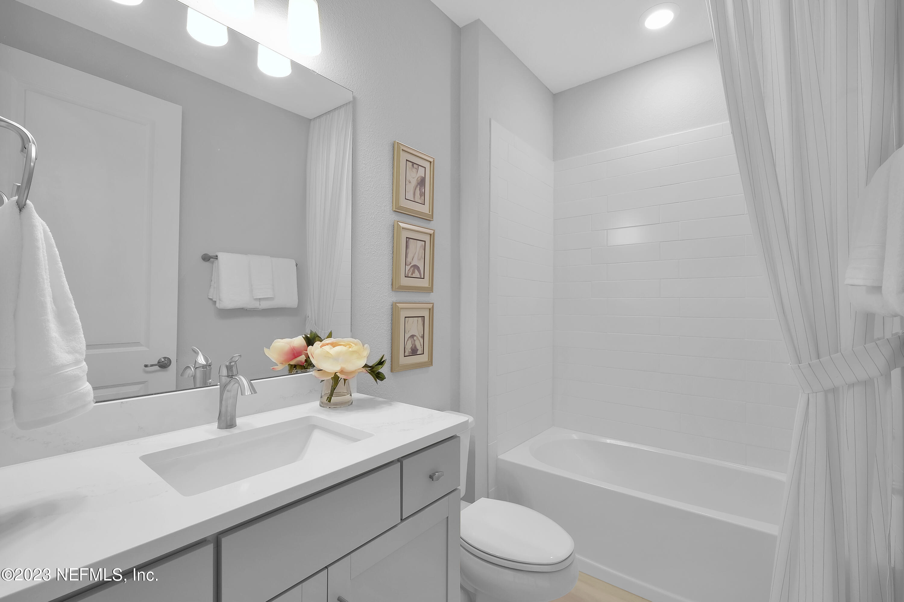 12435 Clapboard Blf Trail Jacksonville, FL 32226 - Photo 20 of 30 a bathroom with a sink toilet and shower