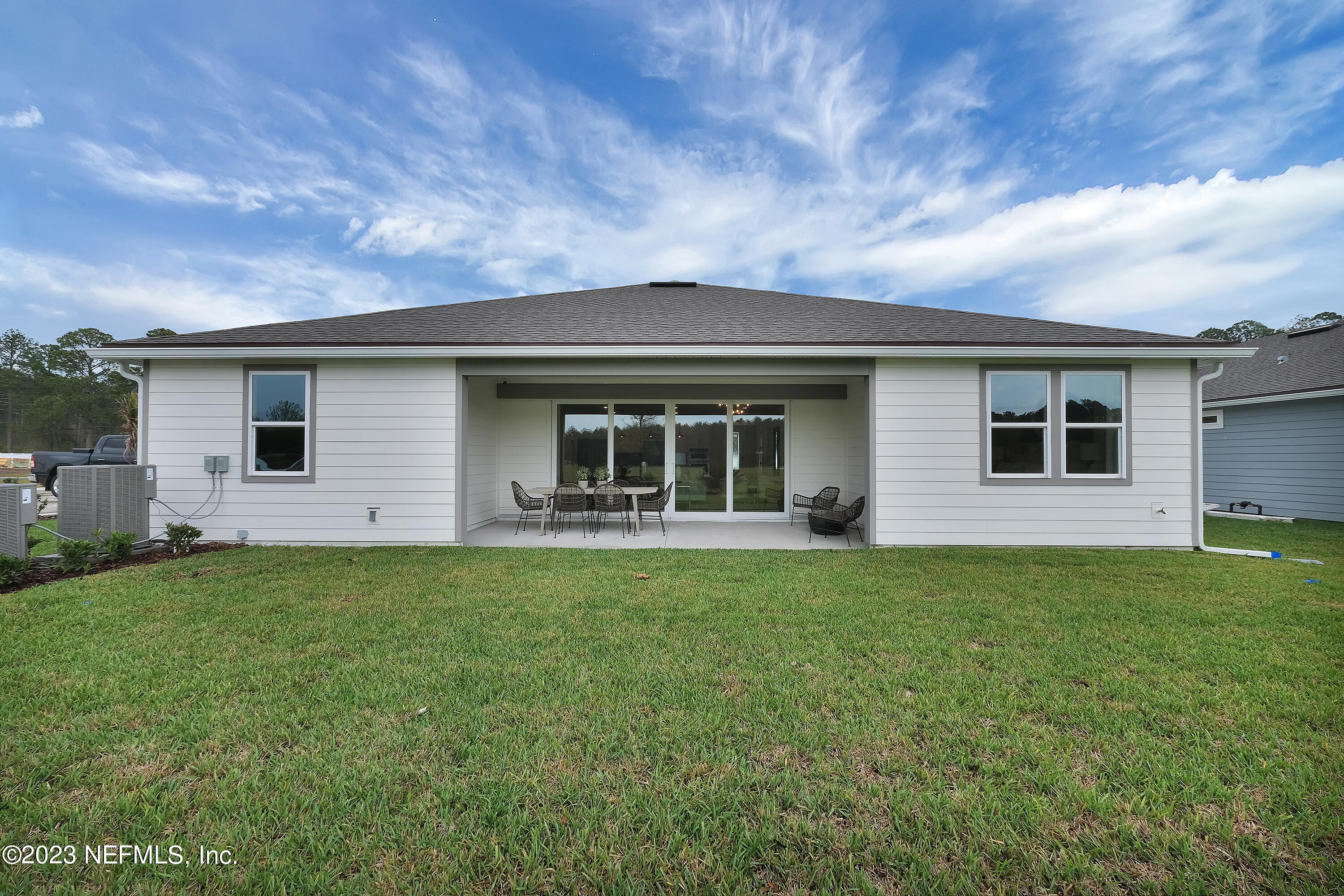 12435 Clapboard Blf Trail Jacksonville, FL 32226 - Photo 26 of 30 a backyard of a house with lots of green space