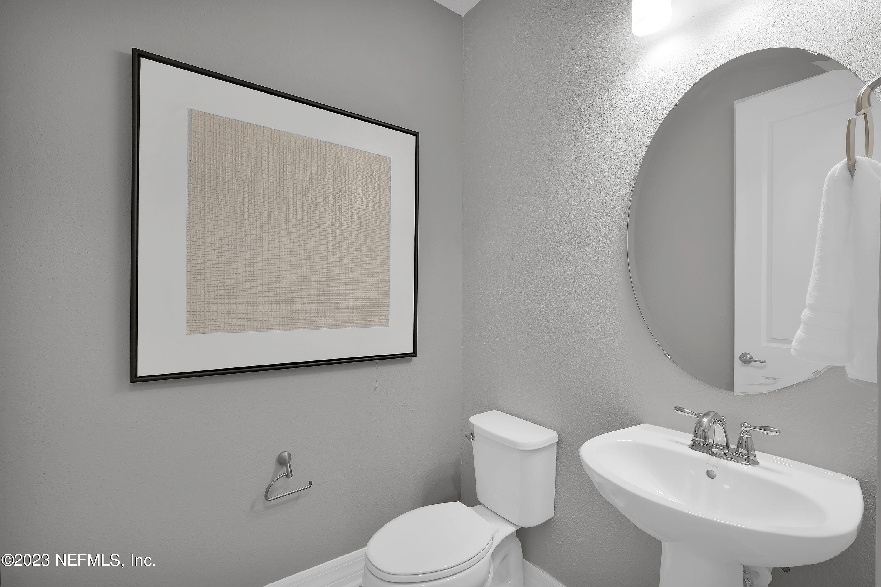 12435 Clapboard Blf Trail Jacksonville, FL 32226 - Photo 5 of 30 a bathroom with a toilet sink and mirror