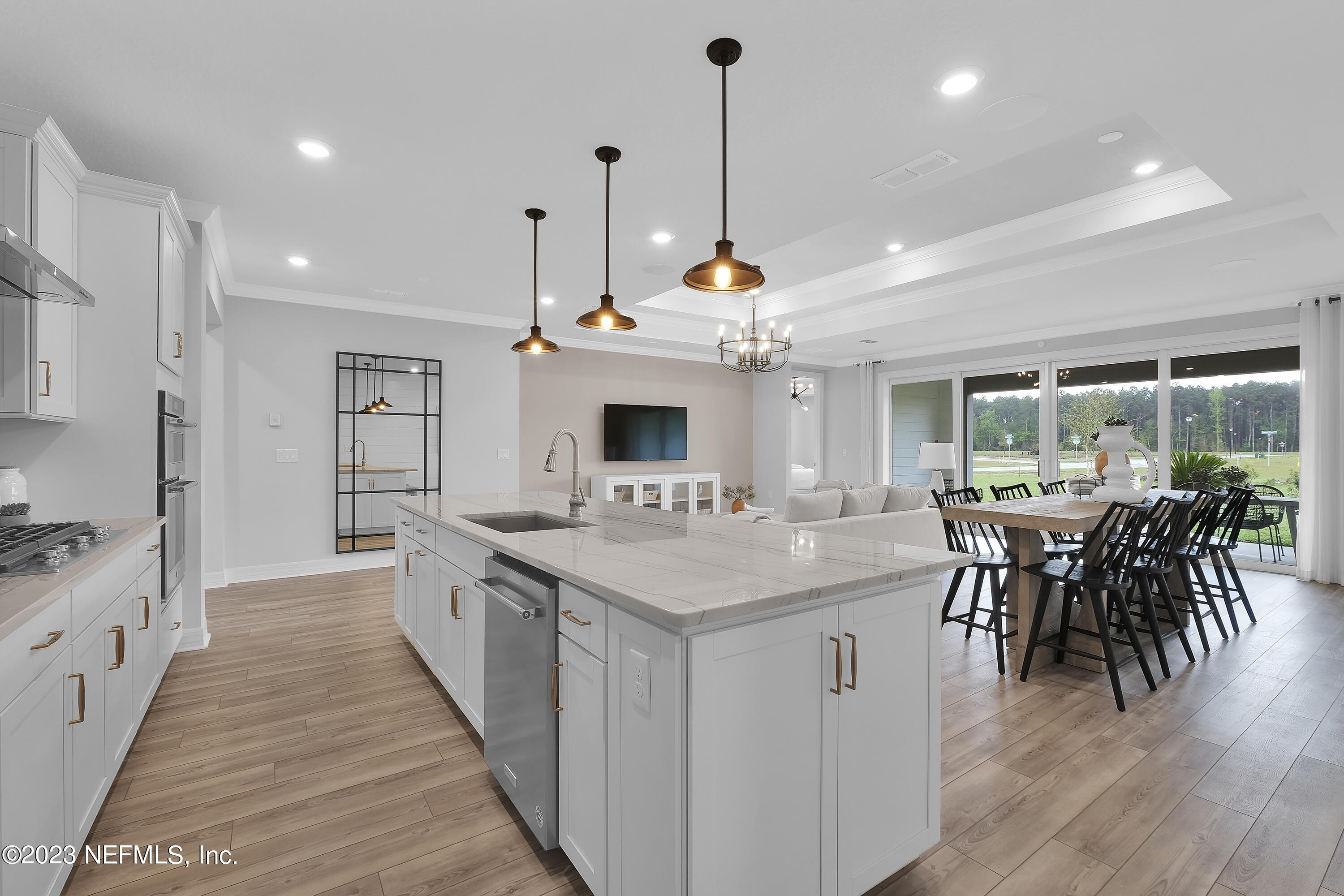 12435 Clapboard Blf Trail Jacksonville, FL 32226 - Photo 8 of 30 a kitchen with stainless steel appliances granite countertop a stove and cabinets