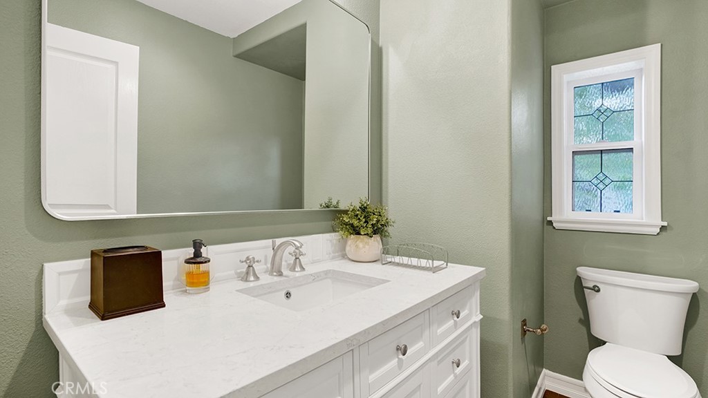 473 Camino Flora Vista San Clemente, CA 92673 - Photo 21 of 59 a bathroom with a sink and a toilet