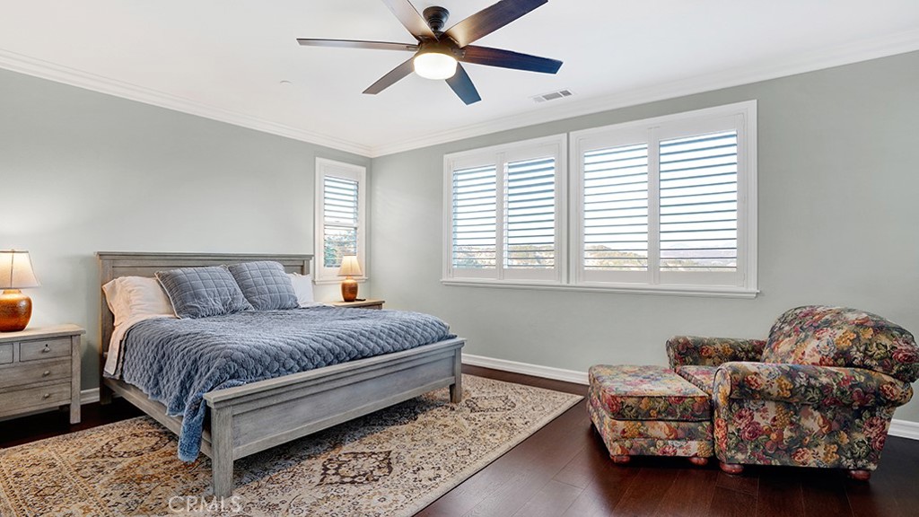 473 Camino Flora Vista San Clemente, CA 92673 - Photo 25 of 59 a living room with a bed window and a couch