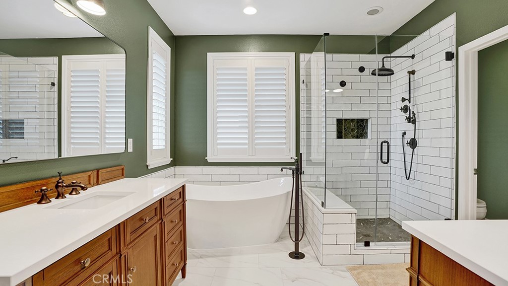 473 Camino Flora Vista San Clemente, CA 92673 - Photo 29 of 59 a bathroom with a sink and a mirror