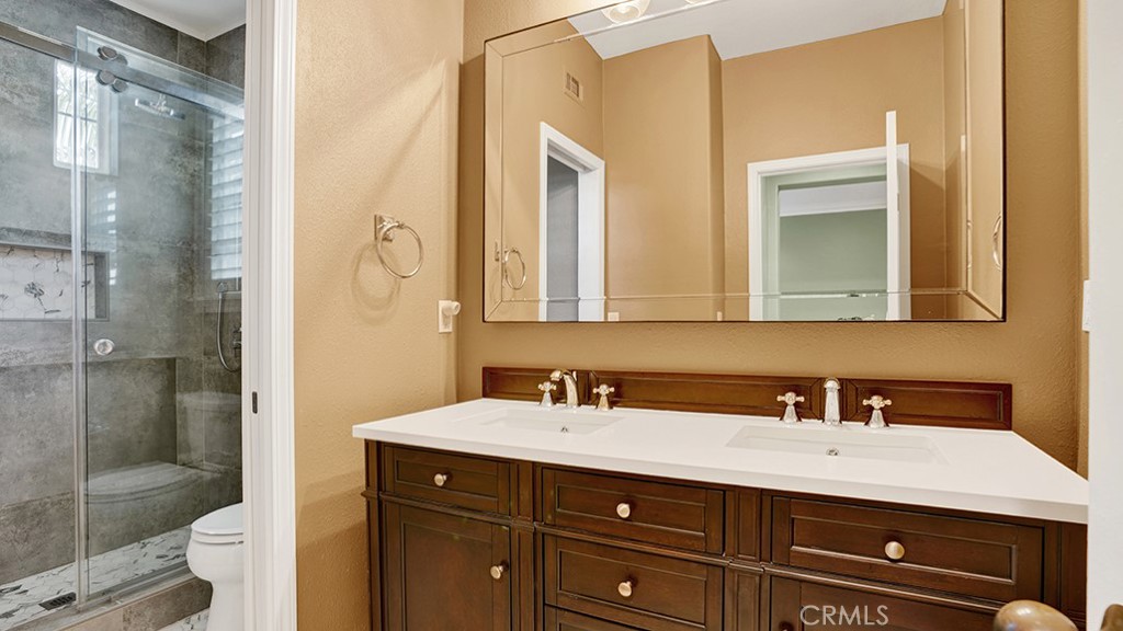473 Camino Flora Vista San Clemente, CA 92673 - Photo 33 of 59 a bathroom with a sink a toilet and shower