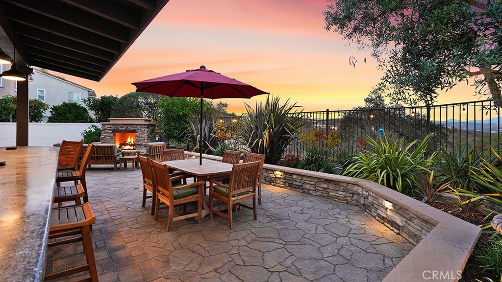 473 Camino Flora Vista San Clemente, CA 92673 - Photo 42 of 59 an outdoor space with furniture and umbrella