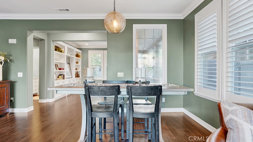 473 Camino Flora Vista San Clemente, CA 92673 - Photo 8 of 59 a view of a a dining room with furniture window and wooden floor