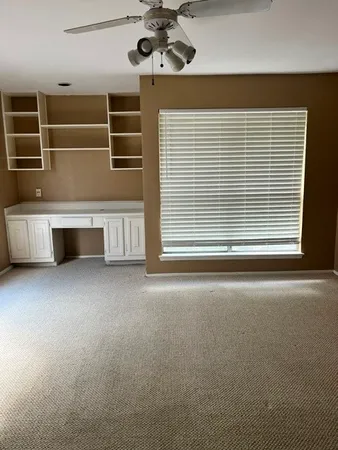 an empty room with a workbench