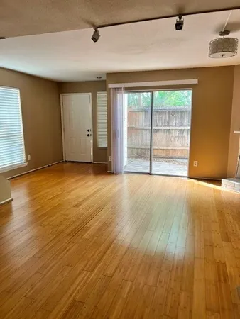 a view of a room with an empty space