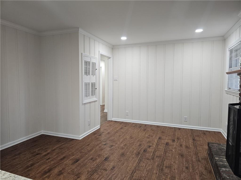 3085 Stantondale Drive Atlanta, GA 30341 - Photo 11 of 20 a view of an empty room with wooden floor and a window