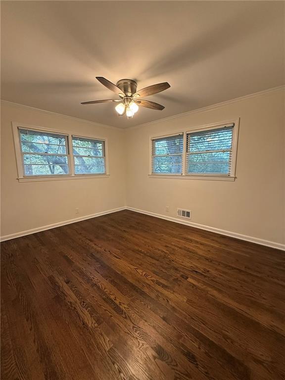 3085 Stantondale Drive Atlanta, GA 30341 - Photo 14 of 20 a view of empty room with wooden floor and fan
