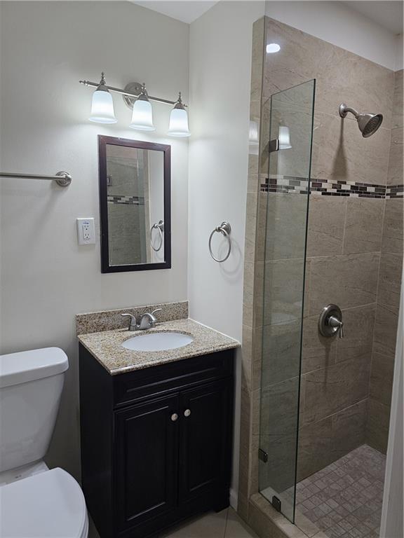 3085 Stantondale Drive Atlanta, GA 30341 - Photo 17 of 20 a bathroom with a toilet sink and shower