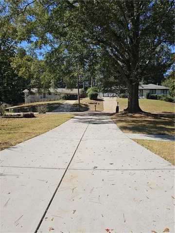 a view of a swimming pool with an outdoor space