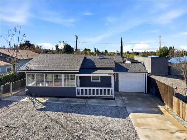 a view of a house with a roof deck