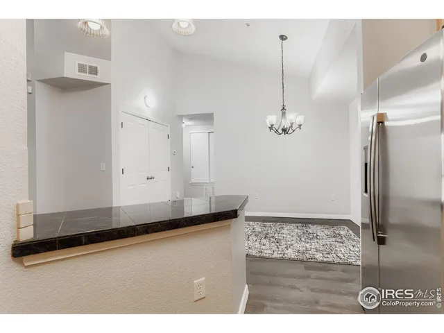 a view of a kitchen with a sink