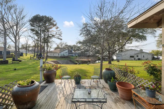 a view of a swimming pool with a patio