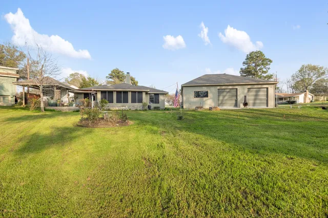 a view of a house with a big yard