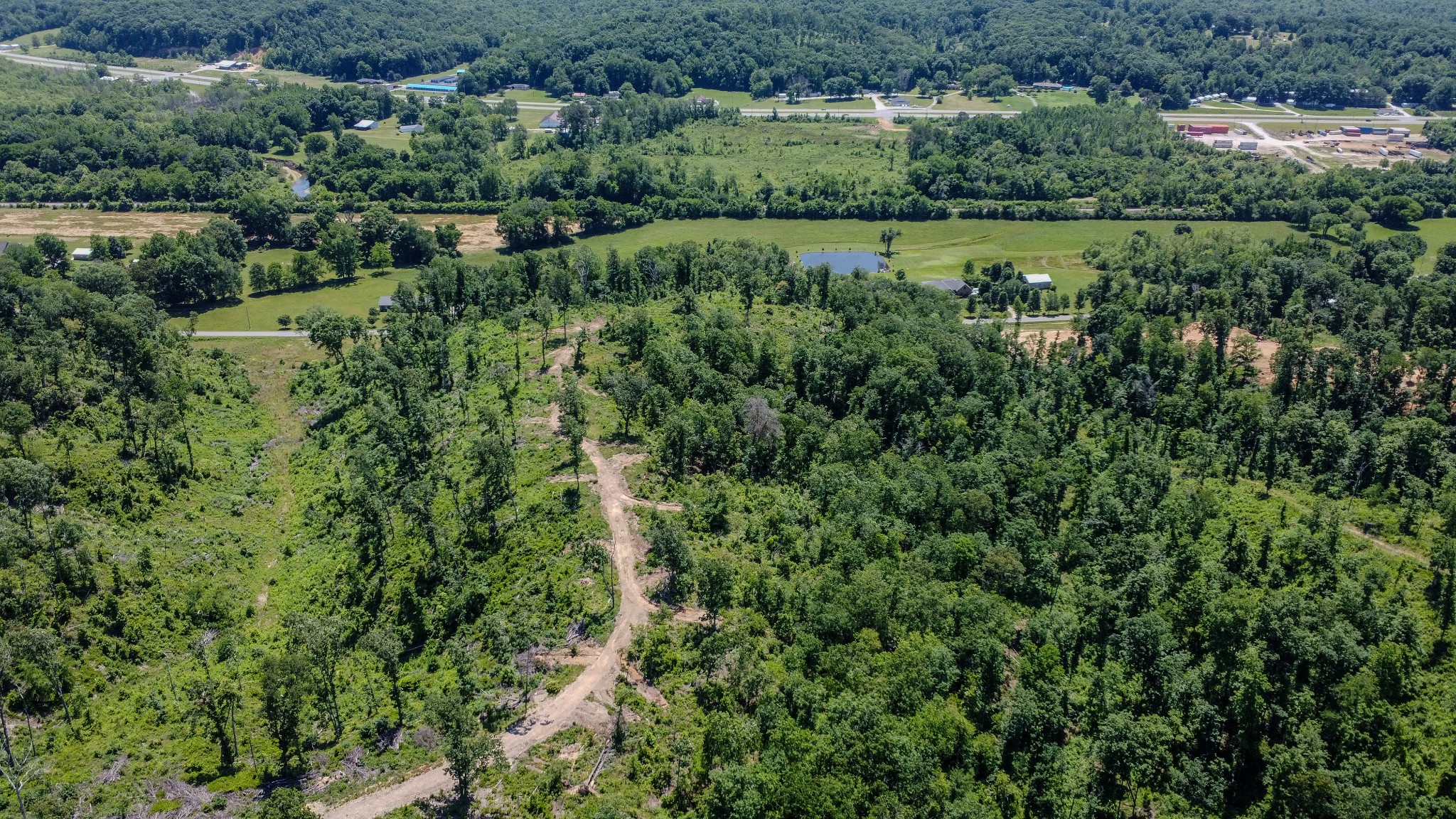 0 West Trace Creek Road Waverly, TN 37185 - Photo 19 of 21 an aerial view of a houses with outdoor space and trees