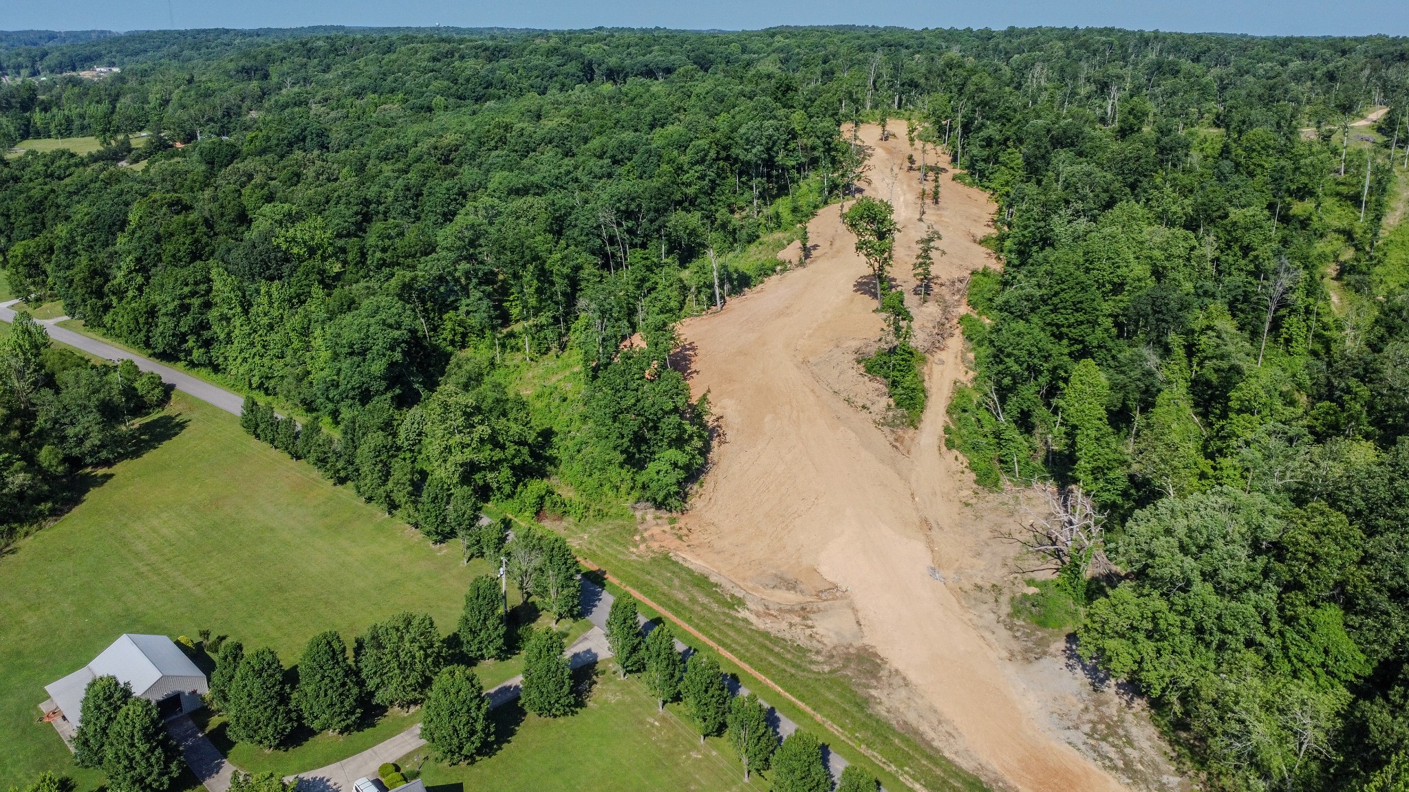 0 West Trace Creek Road Waverly, TN 37185 - Photo 2 of 21 a view of a lake with a yard