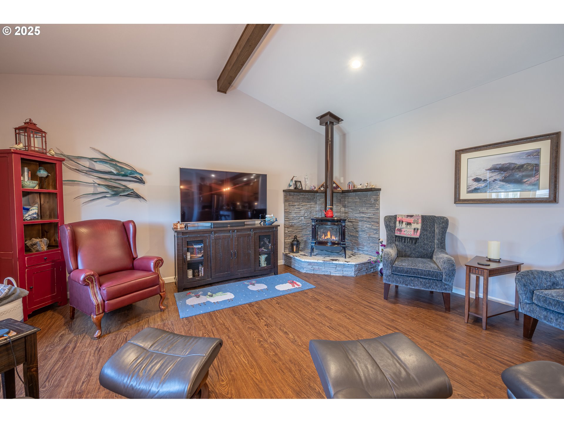 2686 Cedar Loop Bandon, OR 97411 - Photo 12 of 42 a living room with furniture and a flat screen tv