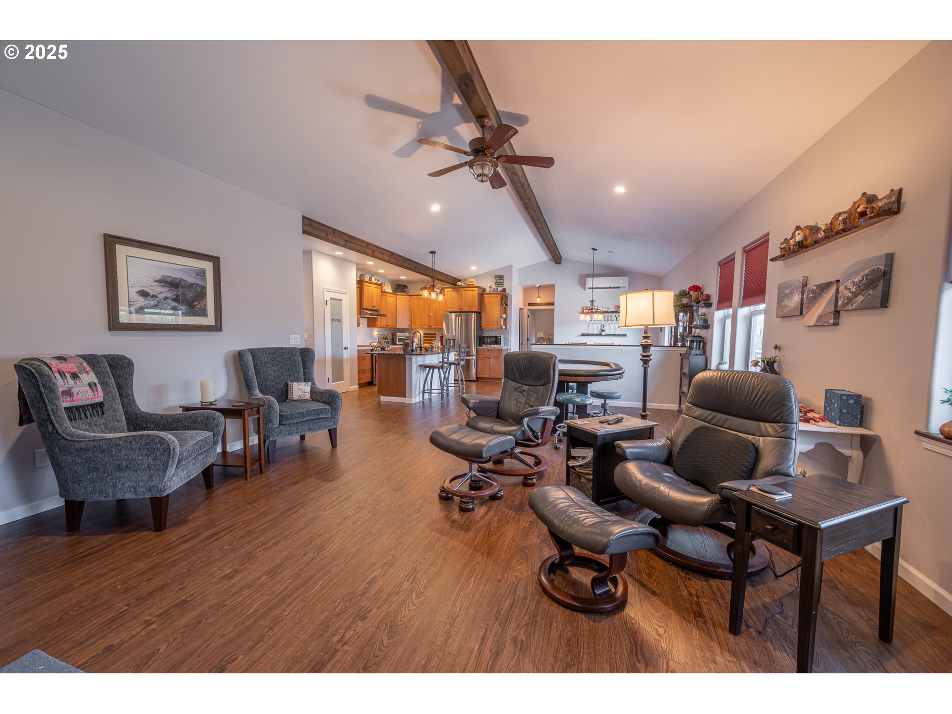 2686 Cedar Loop Bandon, OR 97411 - Photo 14 of 42 a living room with furniture and a flat screen tv