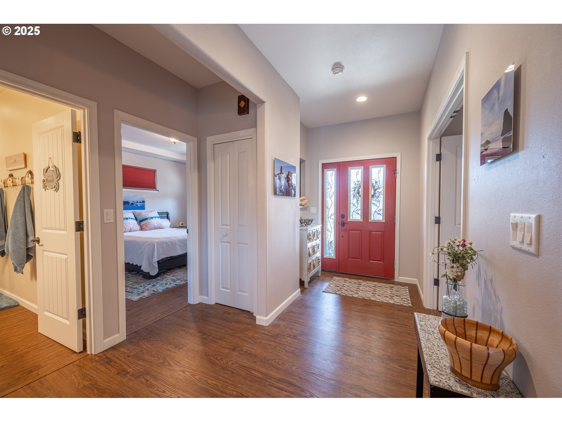 2686 Cedar Loop Bandon, OR 97411 - Photo 28 of 42 a hall way with furniture and window