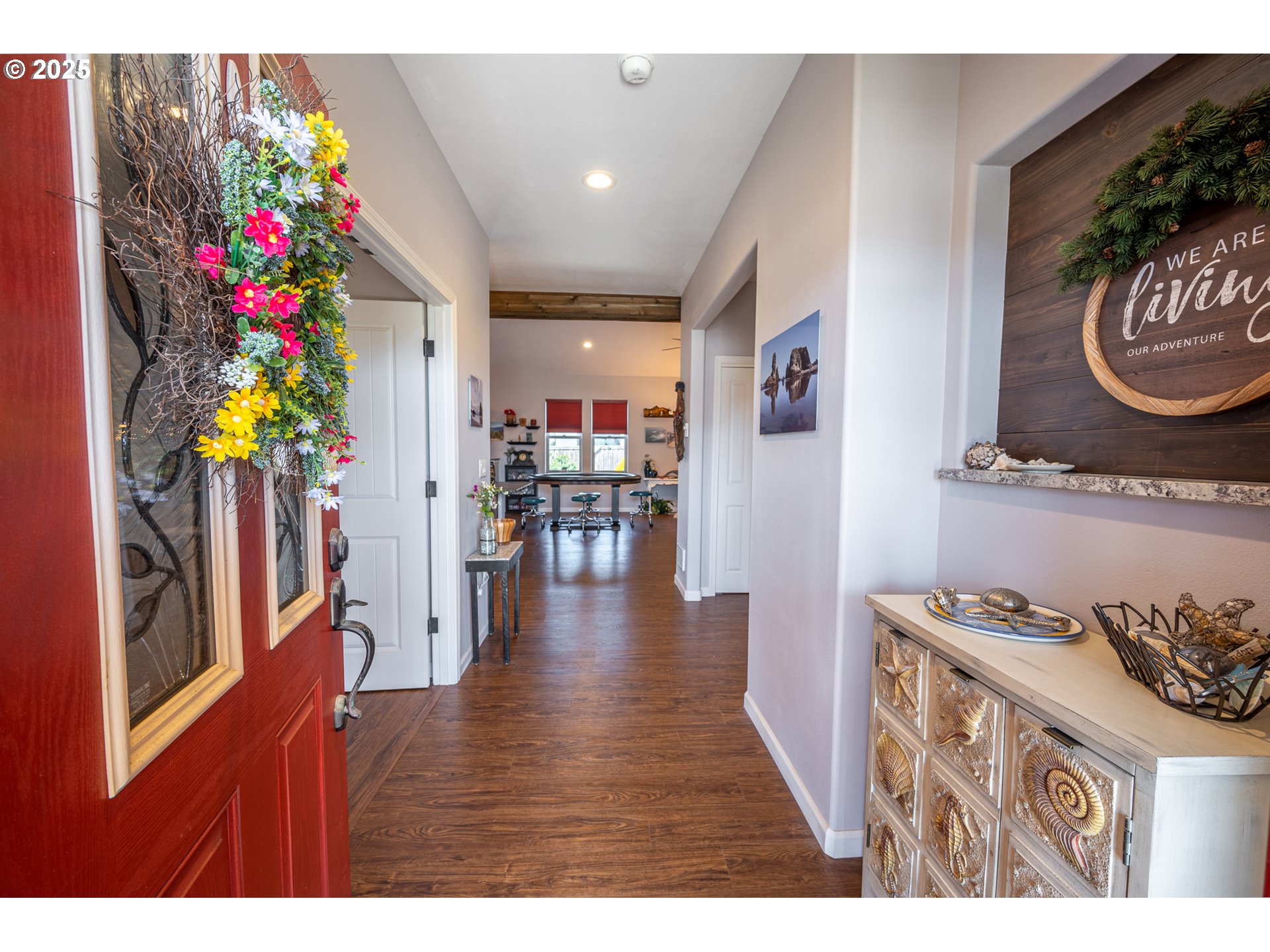 2686 Cedar Loop Bandon, OR 97411 - Photo 7 of 42 a view of entryway with furniture and wooden floor