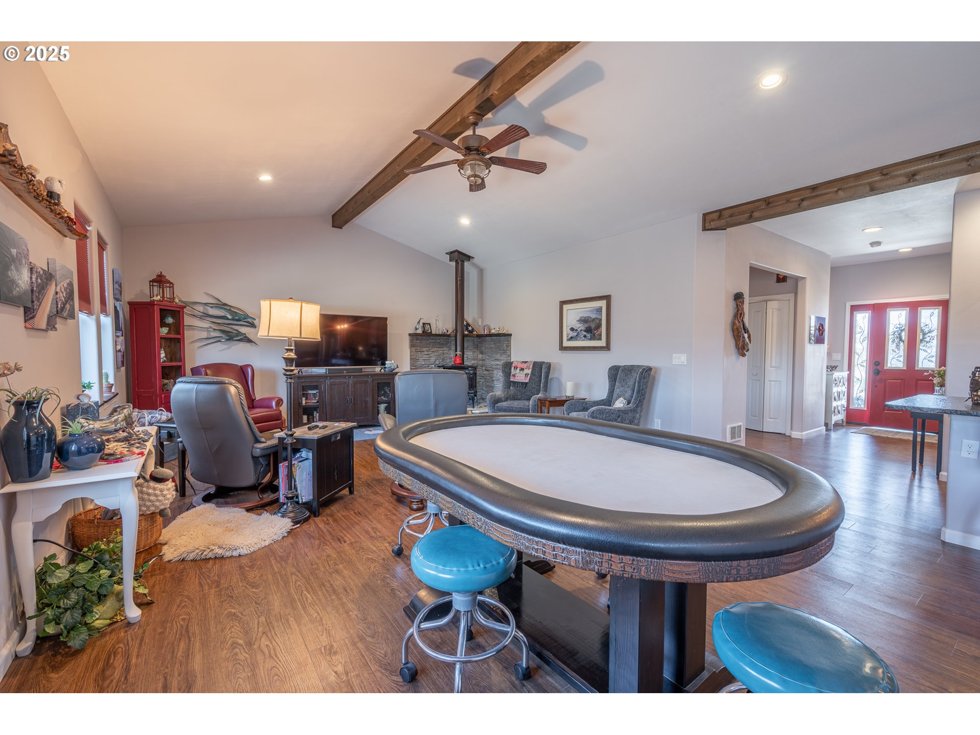 2686 Cedar Loop Bandon, OR 97411 - Photo 10 of 42 a room with furniture and a wooden floor