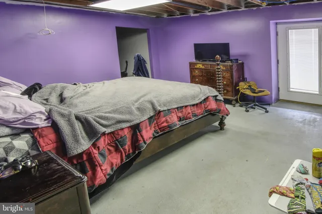 a view of a room with wooden walls