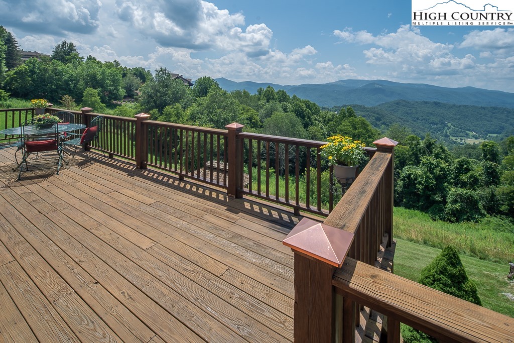 980 Scenic Drive Vilas, NC 28692 - Photo 34 of 42 a view of balcony with deck and wooden floor
