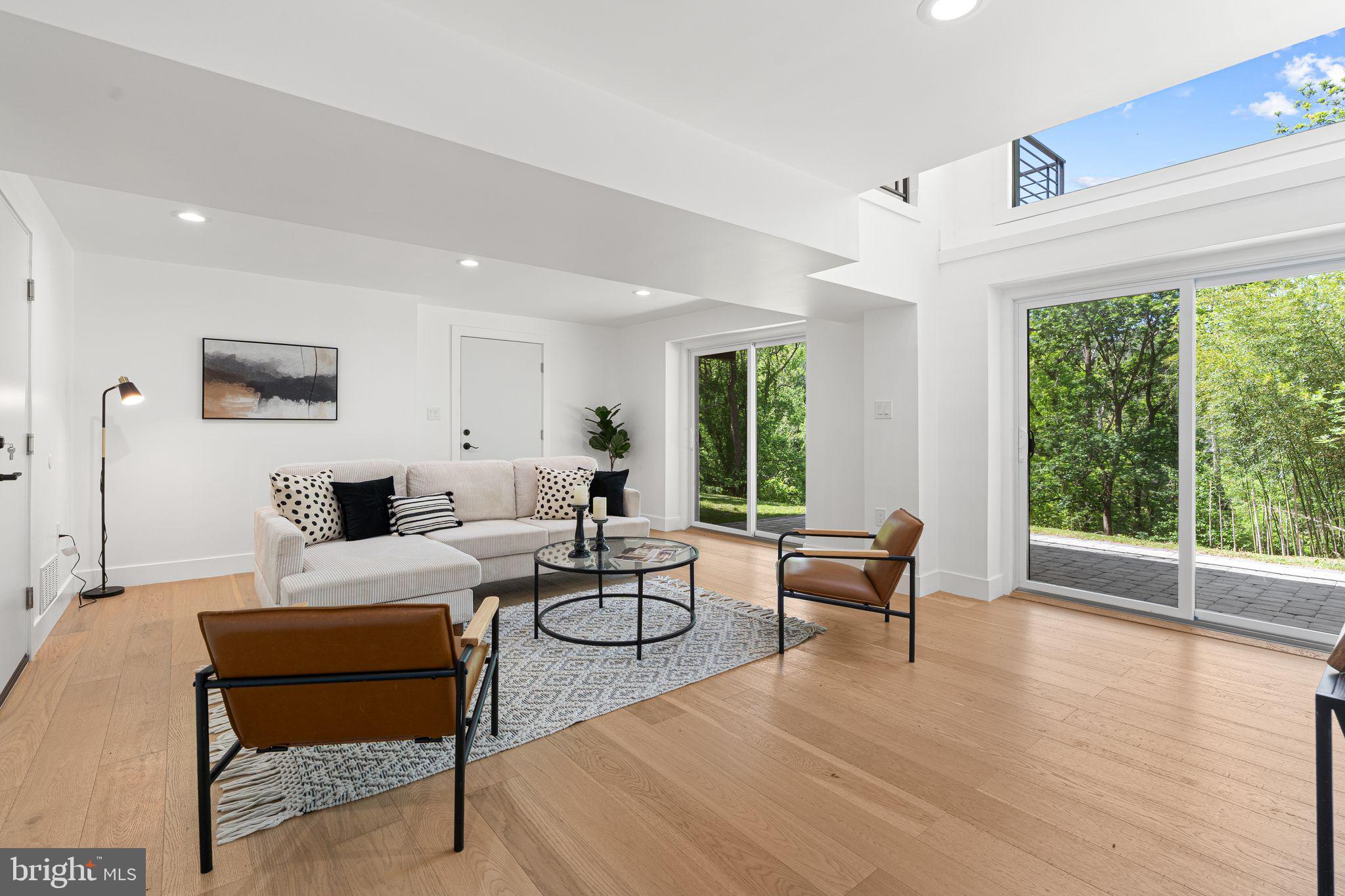 726 Darby Paoli Road Newtown Square, PA 19073 - Photo 35 of 55 a living room with furniture and a large window