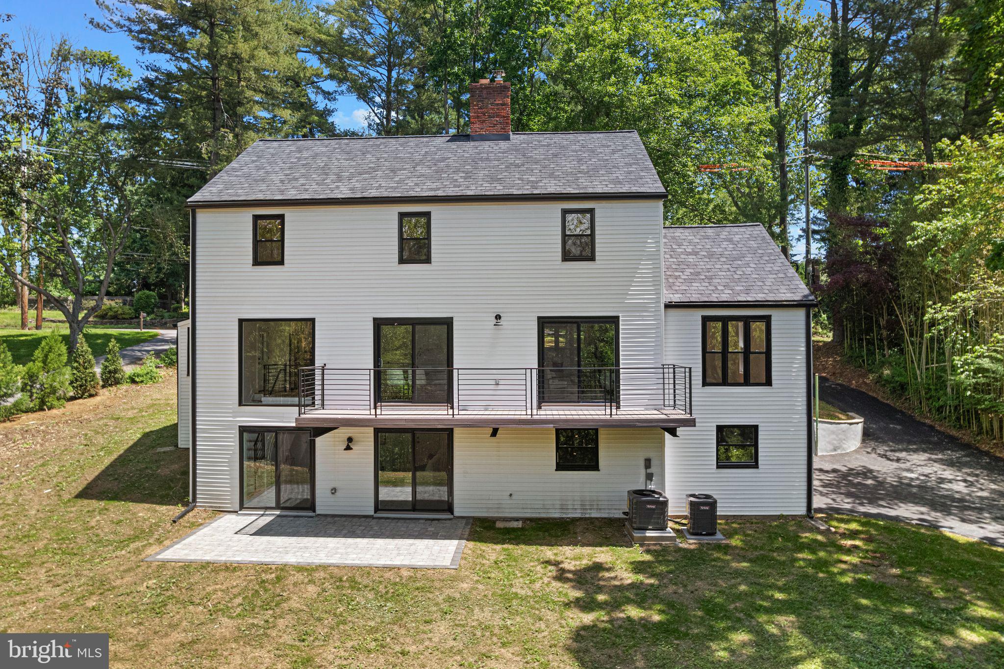 726 Darby Paoli Road Newtown Square, PA 19073 - Photo 4 of 55 a front view of a house with a yard