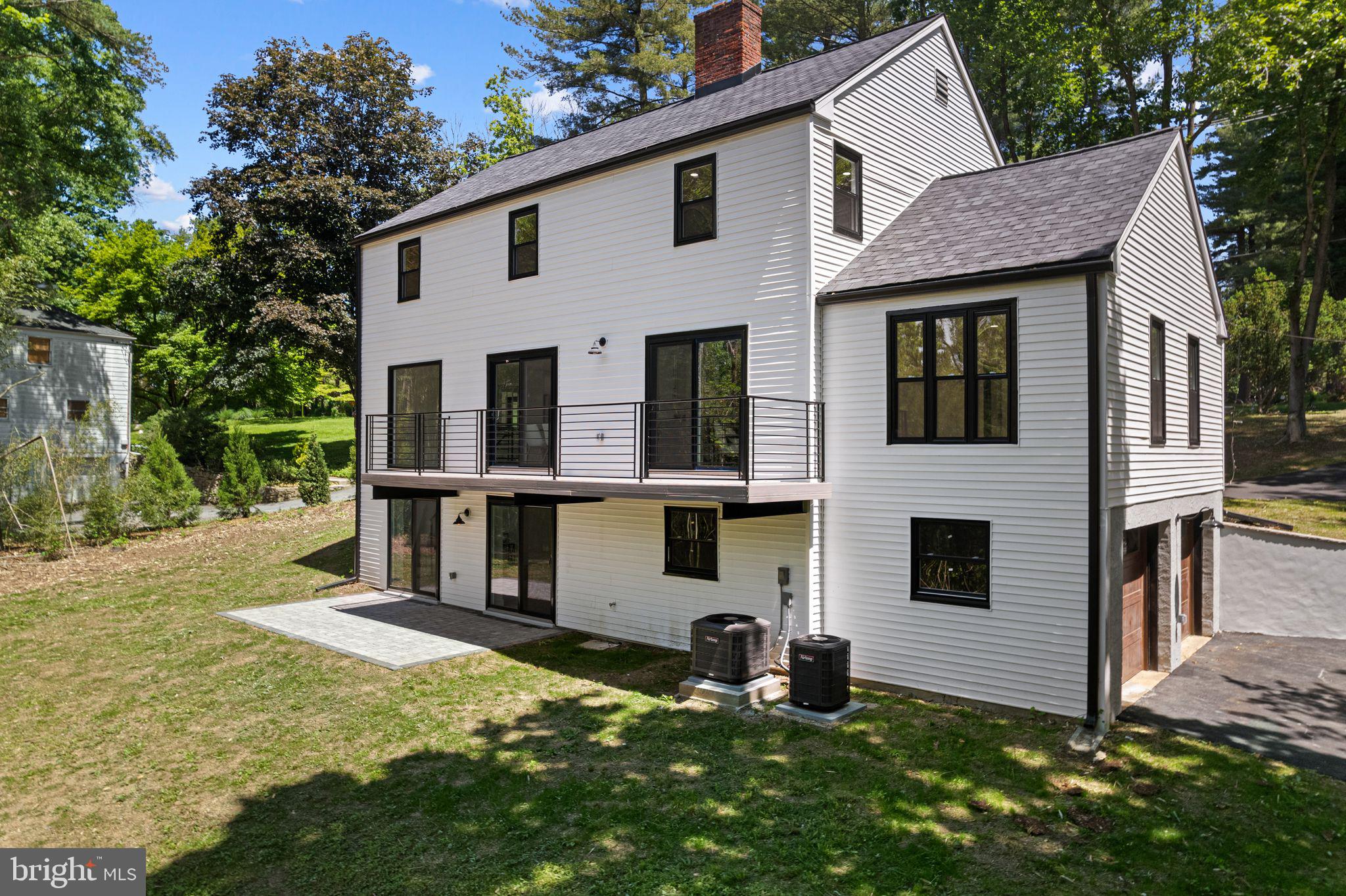 726 Darby Paoli Road Newtown Square, PA 19073 - Photo 5 of 55 a view of a house with backyard and sitting area